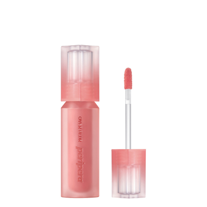 Pink lip gloss with applicator on a white background